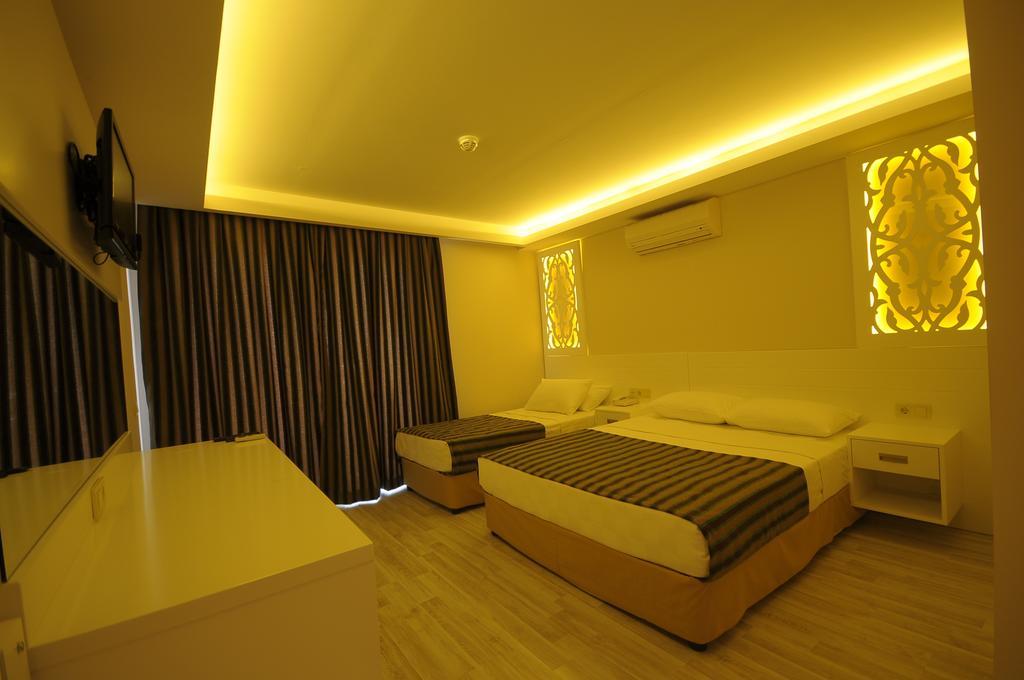 Aura Boutique Hotel Side Quarto foto